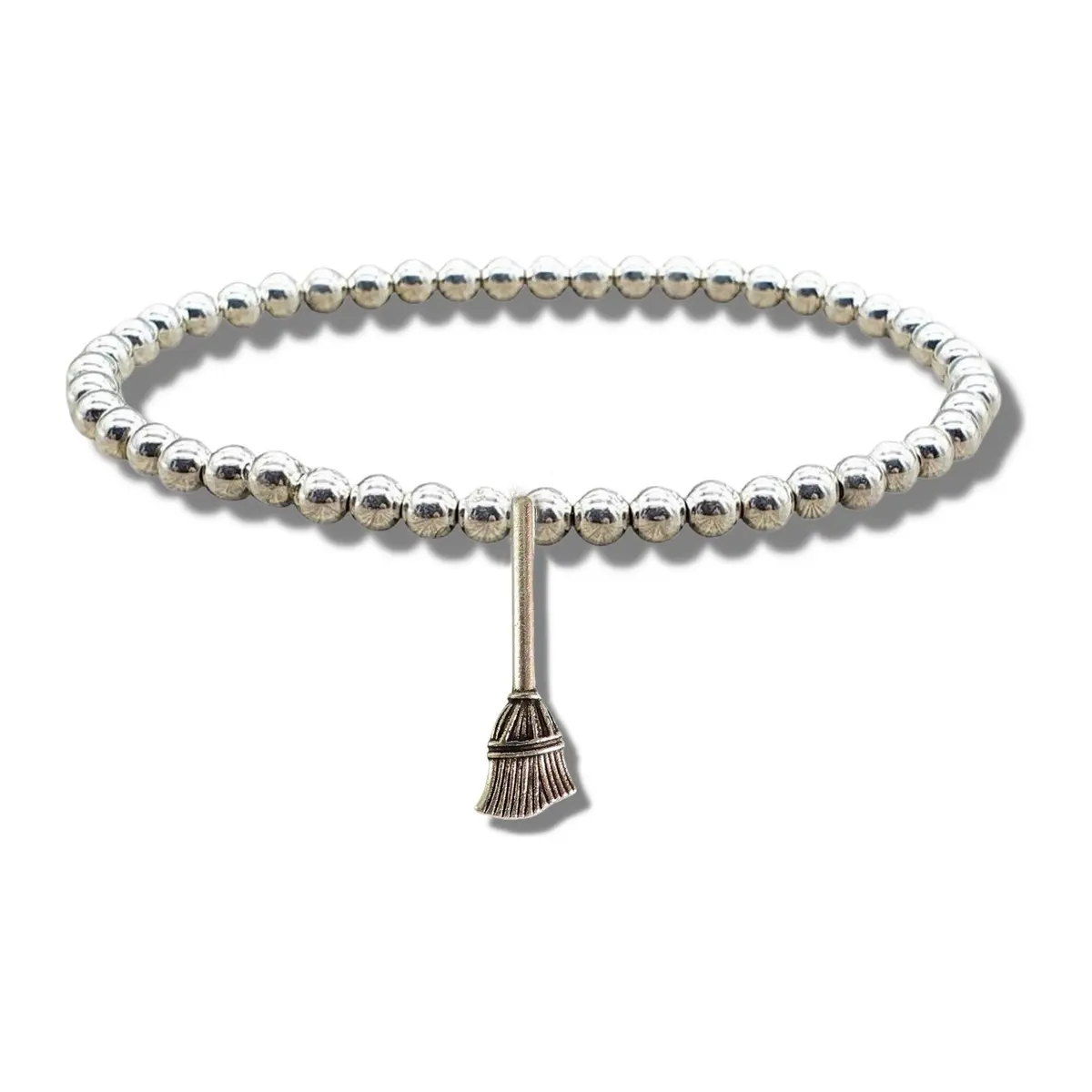 Silver beaded stretch bracelet with a broom charm
