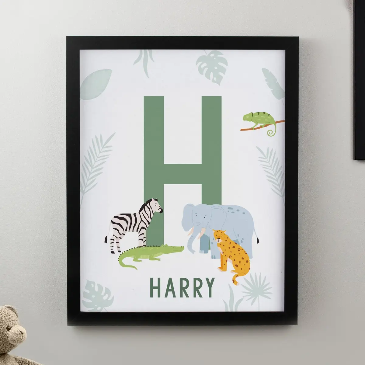 Colourful animal initial framed print in a black or white frame