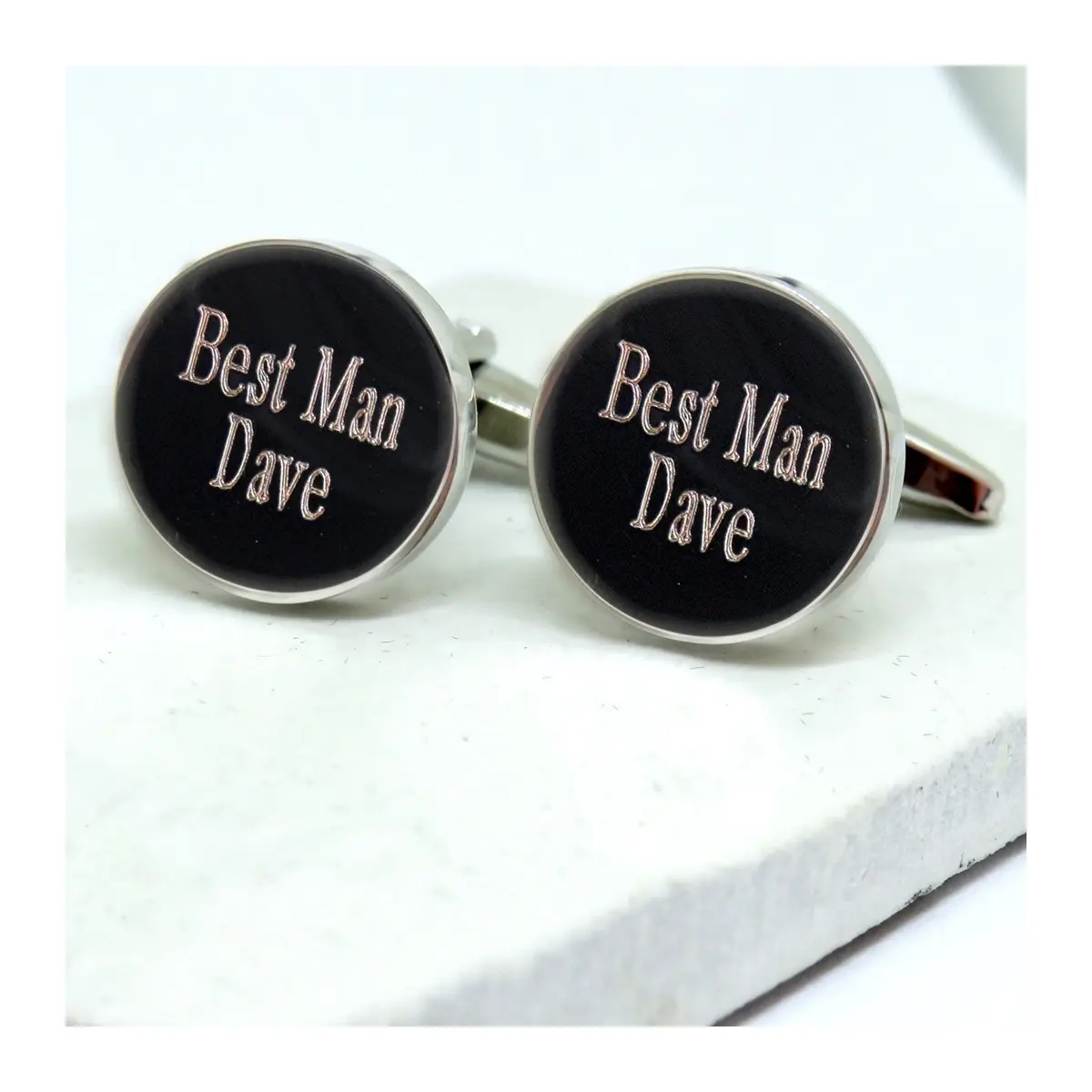 Round silver coloured personalised best man cufflinks, engraved with a name.