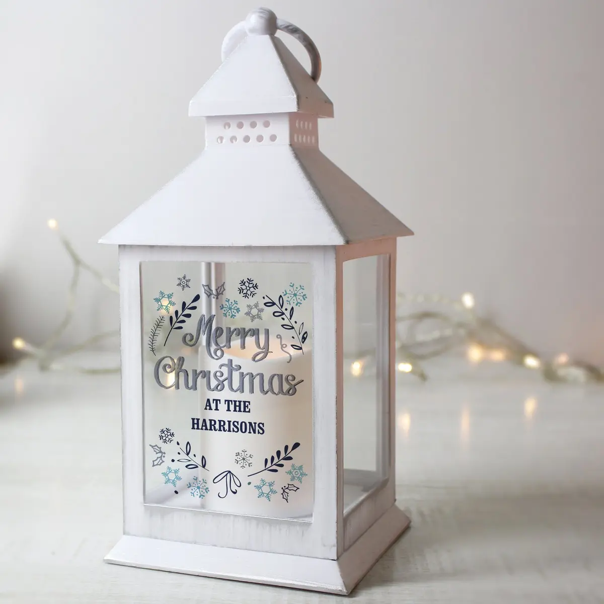 Frost white Christmas lantern with a hoop on top and personalised text