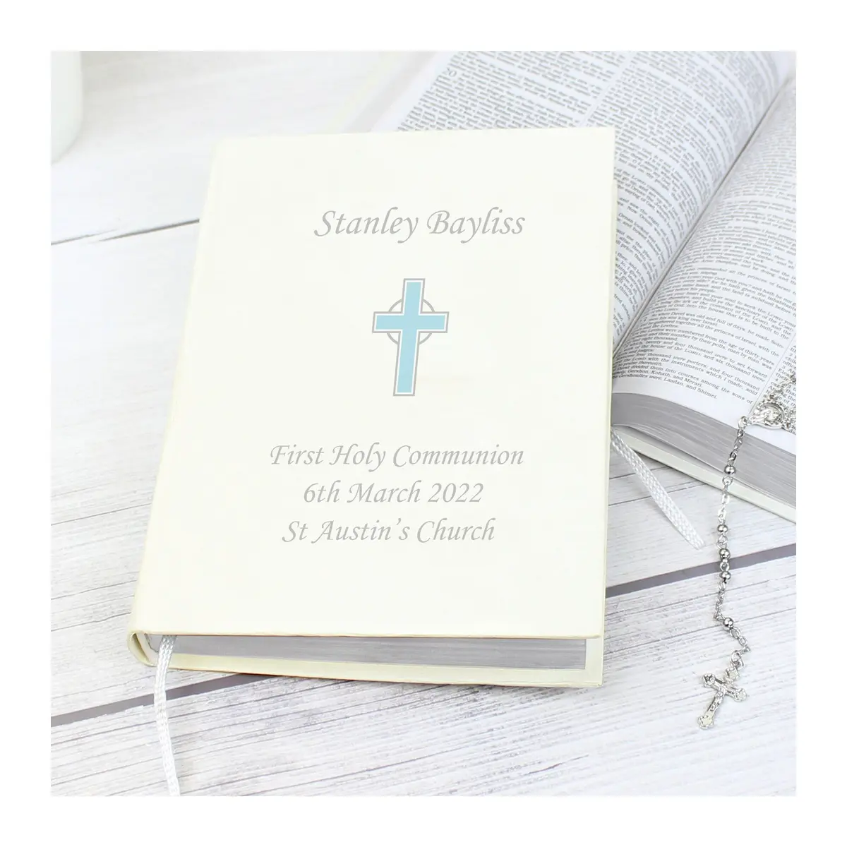 Personalised cross Holy Bible with a leatherette cover in blue or pink
