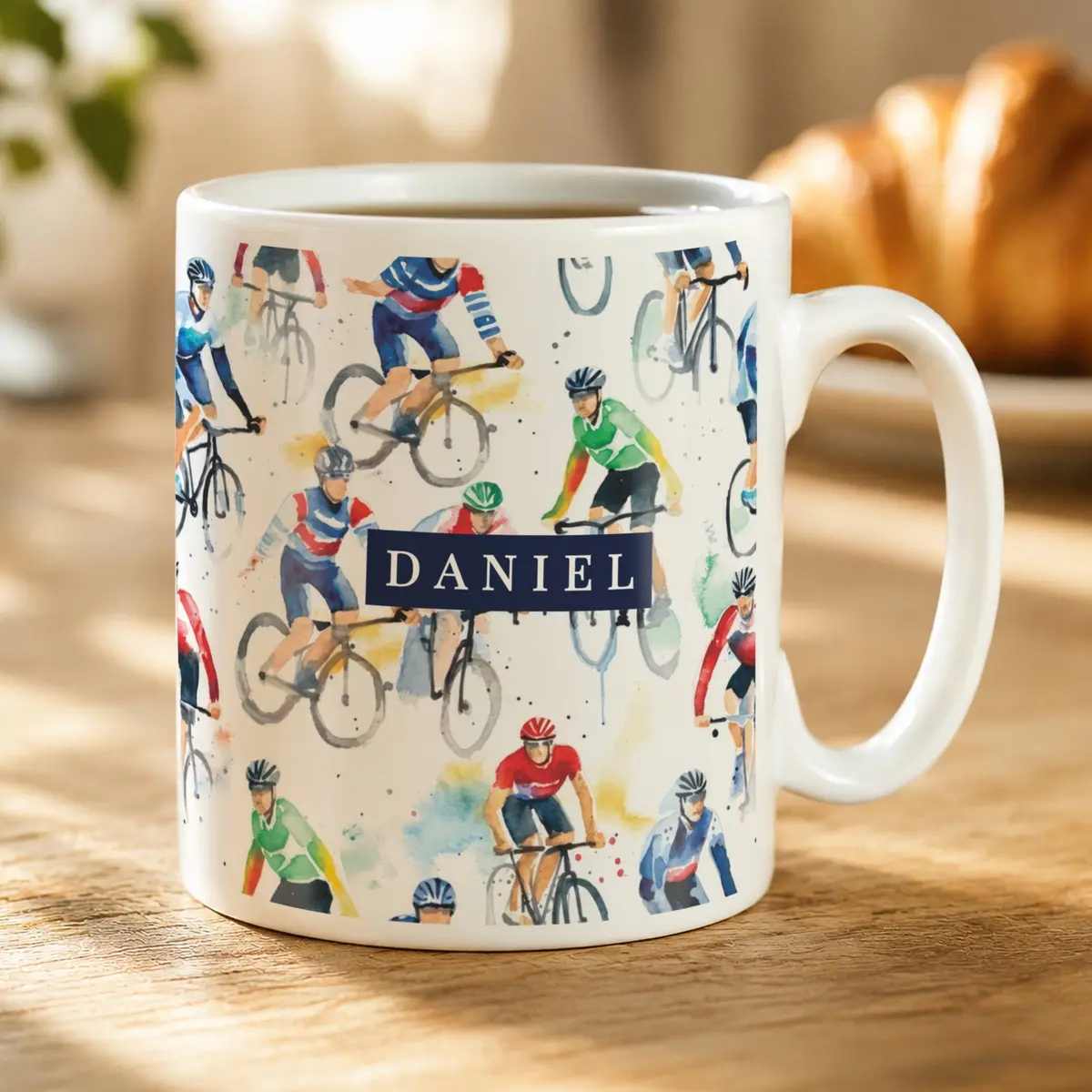 Ceramic mug with a cycling bag design wrapped around it