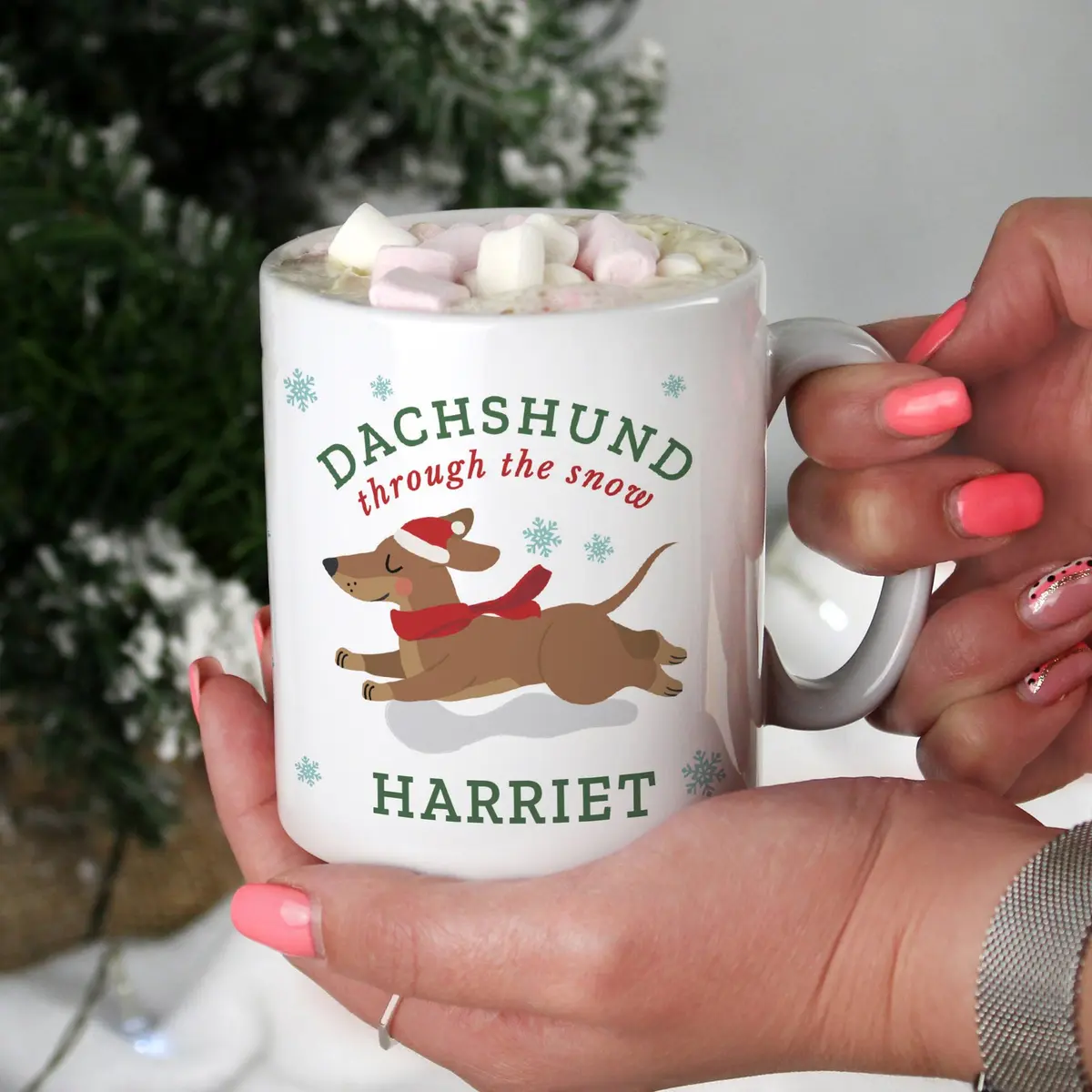 Personalised ceramic Christmas mug with a dachshund design and a name