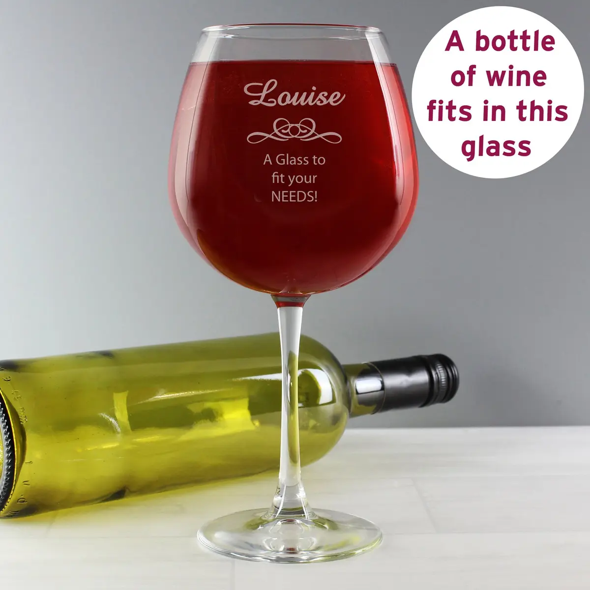 Decorative bottle of wine glass personalised with a name and message