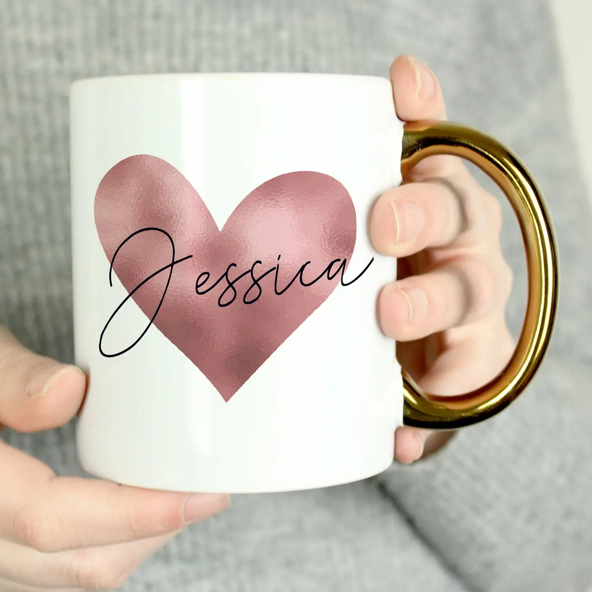 Personalised ceramic mug with a gold handle