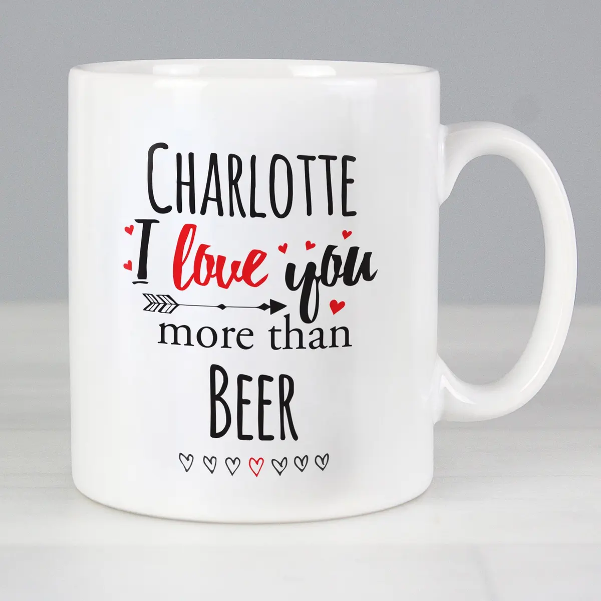Ceramic mug reading I love you more than with a name on the front