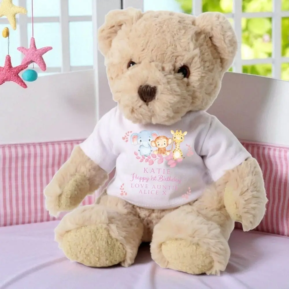 Teddy bear in a T-shirt with an elephant, monkey and giraffe design