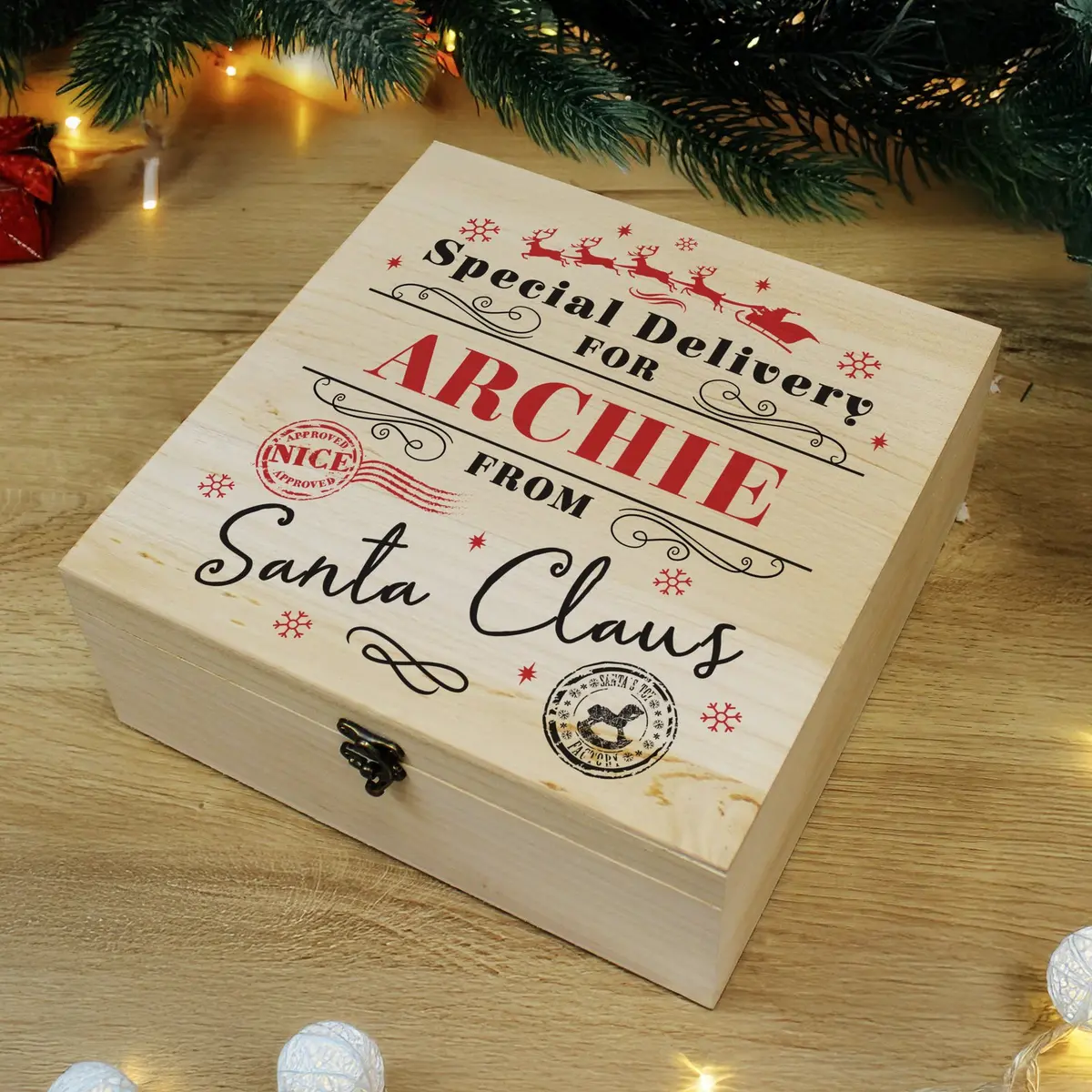 Wooden personalised Christmas Eve box with a metal clasp