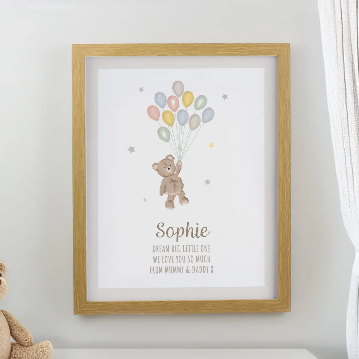 Oak frame with a teddy and balloon print and personalised lines of text