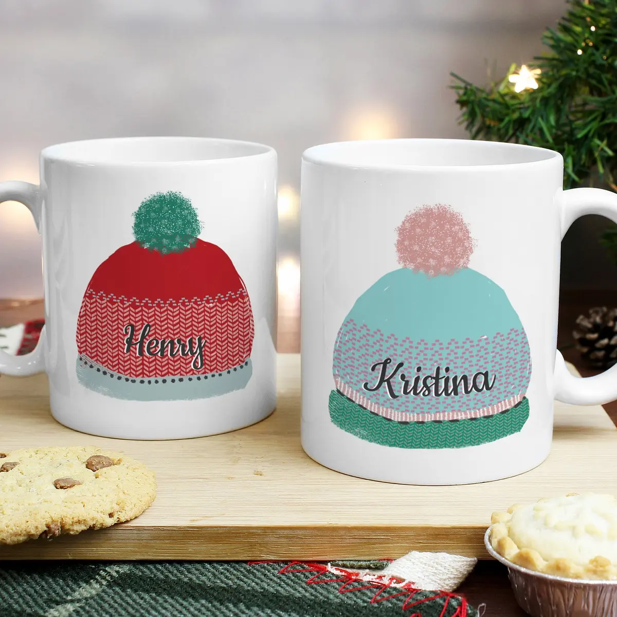 Set of two ceramic mugs with red and blue woolly hats